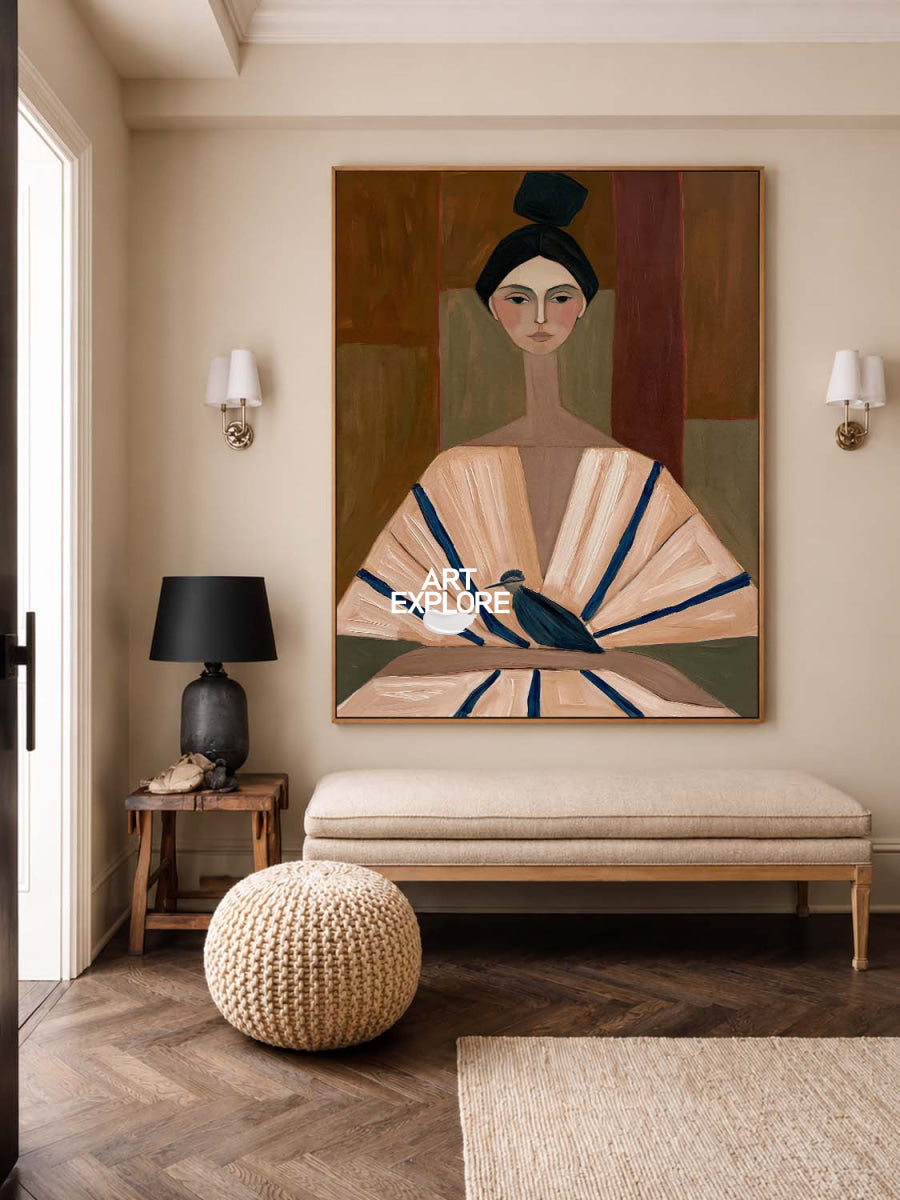 A large framed art print depicting a stylized woman in a fan-like dress with a bird, displayed on a beige wall in a modern living room setting above a bench.